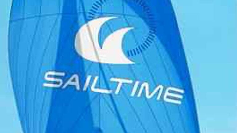 Closeup of a blue sail with the SailTime logo