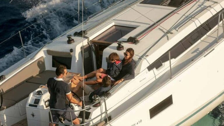 Family sailing a Jeanneau Sun Odyssey 410