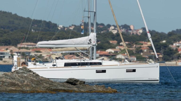 Beneteau Oceanis 38.1 "Wright By The Sea" anchored near the shore