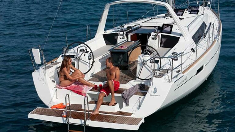 Beneteau Oceanis 41 couple relaxing on the stern