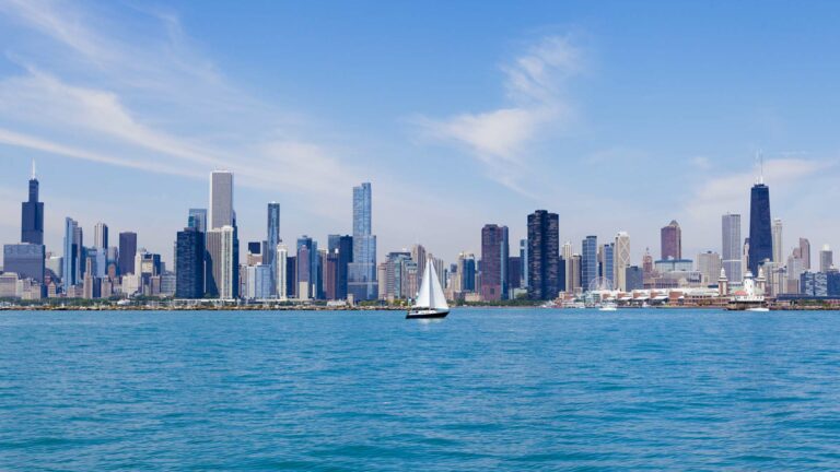 Sailboat on the water with the Chicago skyline in the background