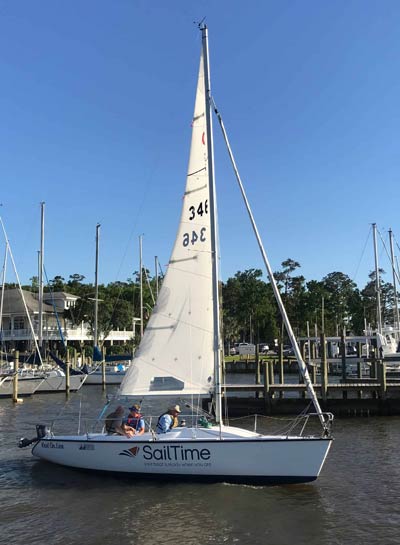 "Knot On Line" sailboat leaving the dock