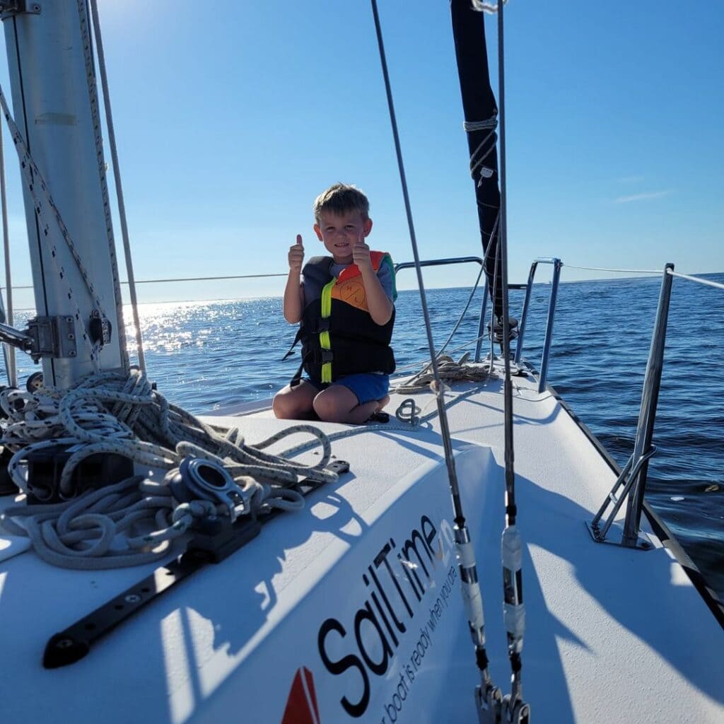 Kelly's youngest son Logan enjoying a beautiful day sailing on the Gulf Coast.