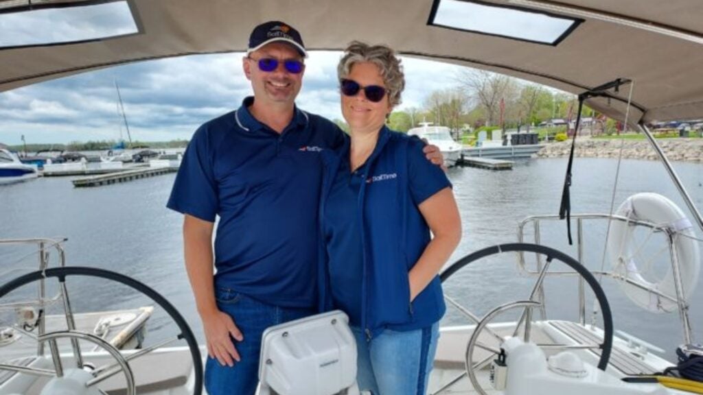 Bill & Suzie Wons aboard one of their SailTime Door County Fleet Sailboats.